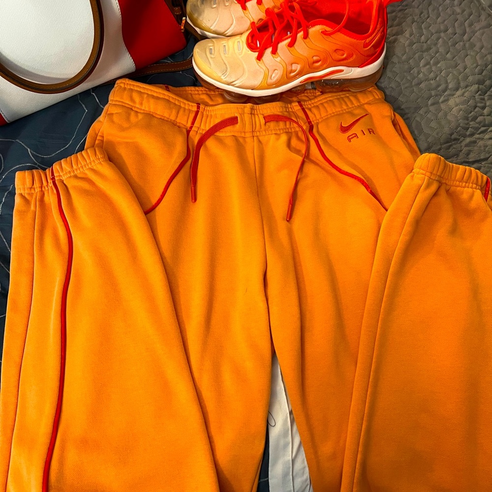 Orange Nike Air joggers
